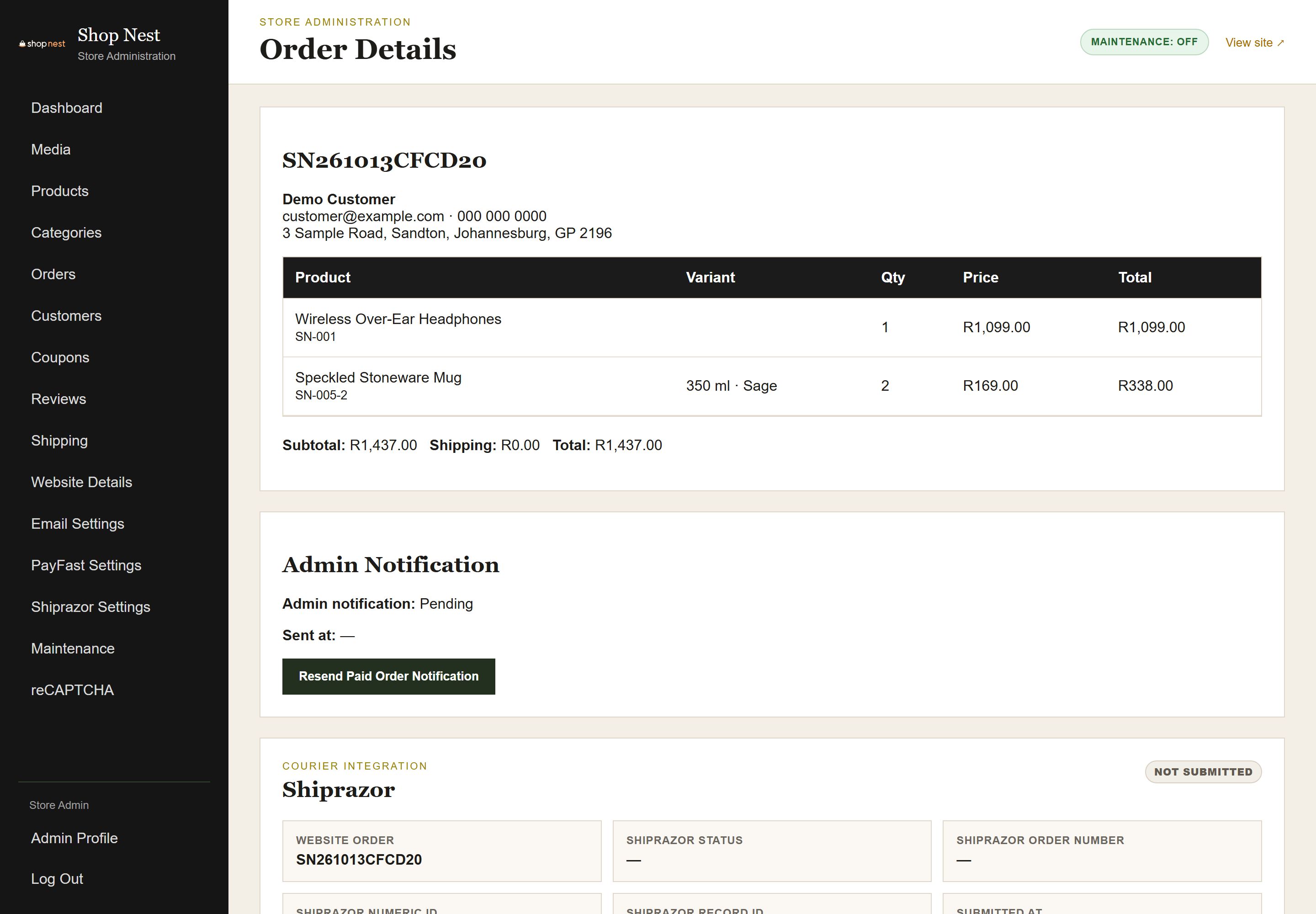 Admin order detail page showing the items, customer and address, payment status, fulfilment status, courier and tracking number fields.