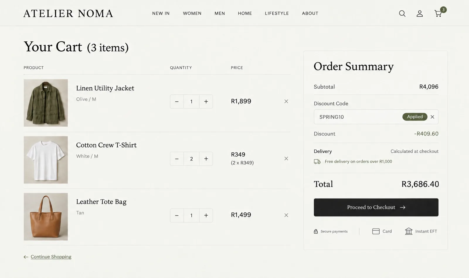 Example shopping cart page with three clothing items, quantity controls, remove links, an applied discount code and an order summary with a Proceed to Checkout button