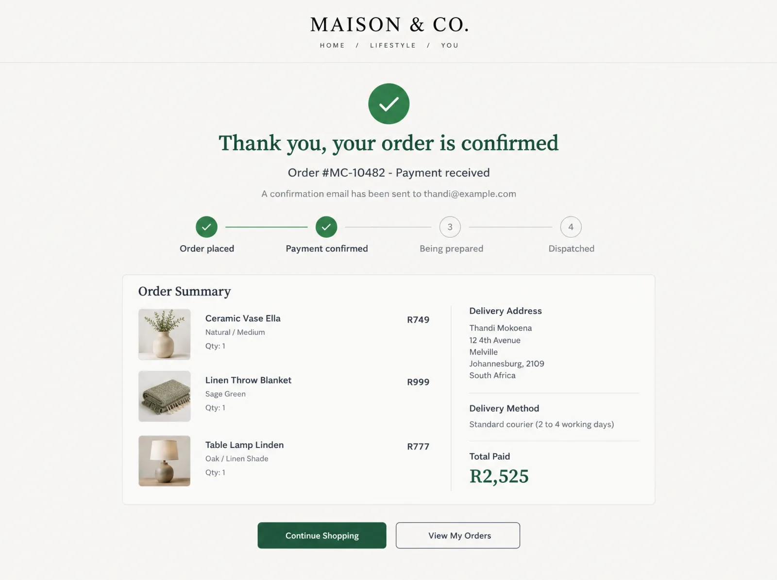 Example order confirmation page after a successful payment, with a green check, the order number, a progress tracker, the order summary, delivery details and the total paid