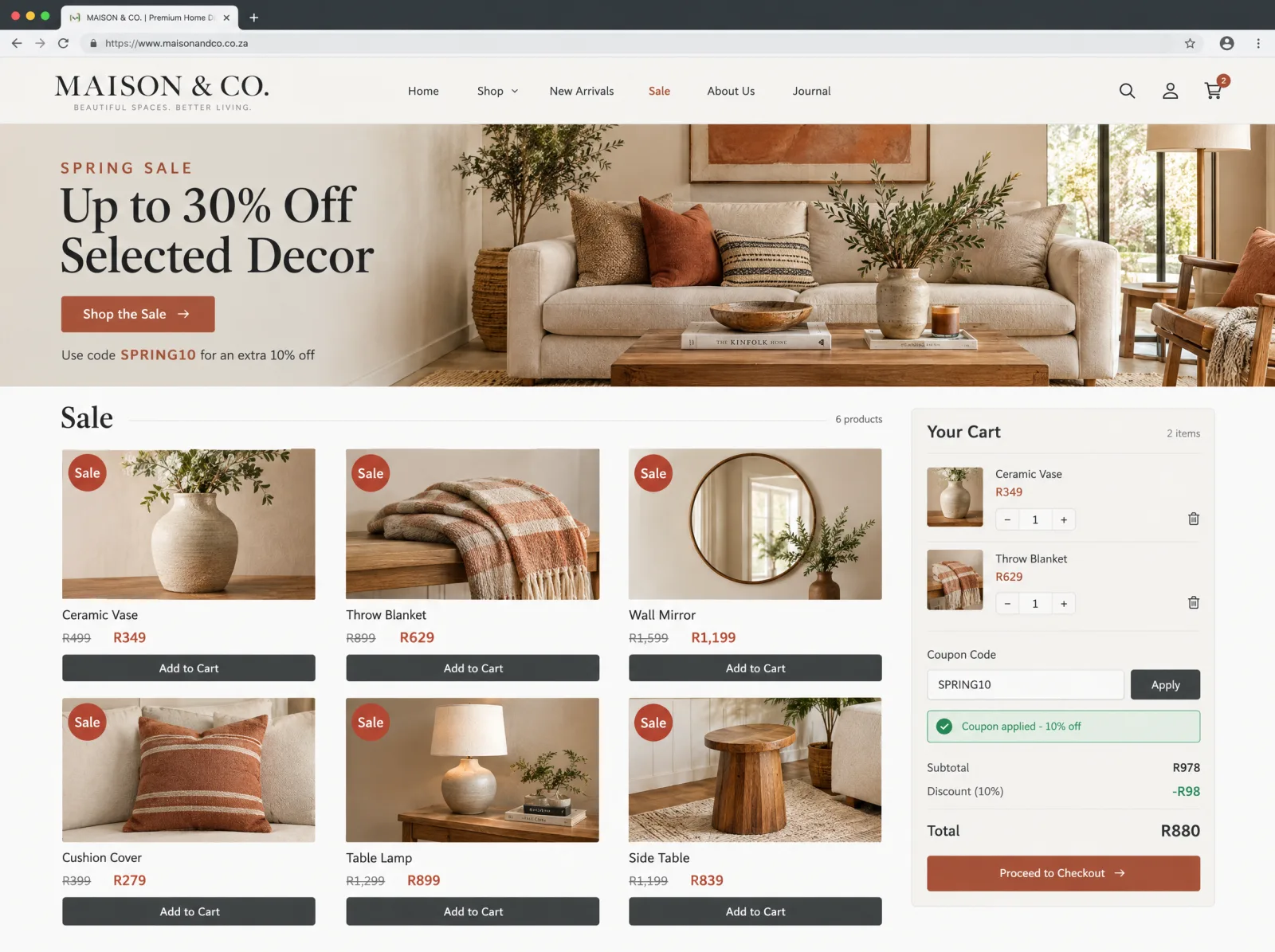 Example seasonal sale with a Spring Sale banner, sale product cards with struck-through and new rand prices, and a cart with the coupon code SPRING10 applied