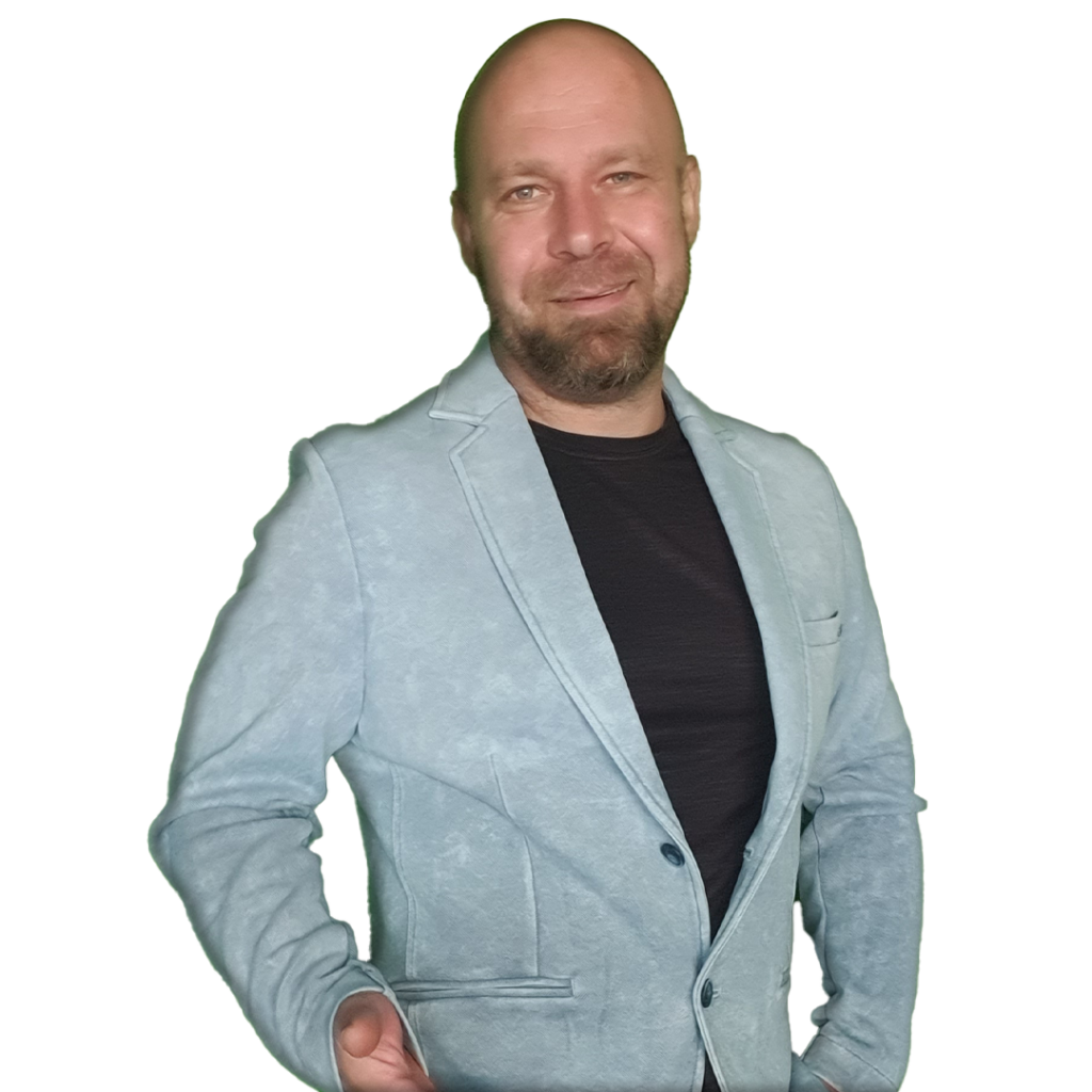 Quentin Rebb, the owner of X3web standing in a blue blazer